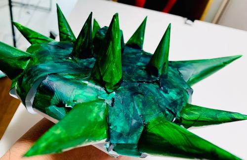 Image of covid-19 spiked artwork painted in green